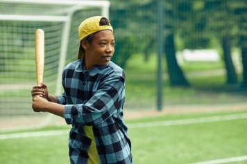 Boy swinging a baseball bat