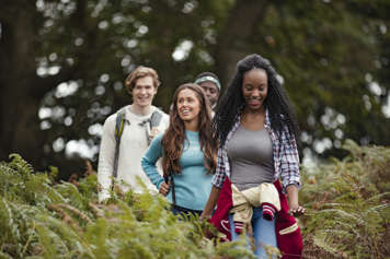 Teens on a hike in the woods