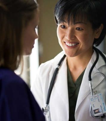 Doctor and teen patient